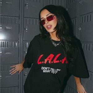 ISO—Dressed in LALA “Don’t Tell Me What To Do” Black T-Shirt w/Red & White Print